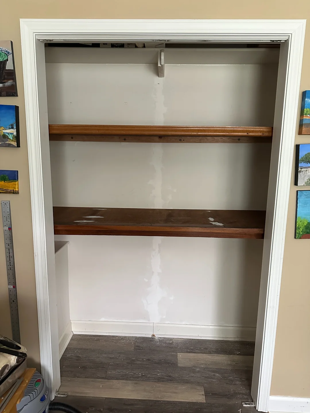 Closet shelves made from salvaged wood before painting.